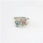 Engagement flower ring in sterling silver with pink sapphire and blue topaz