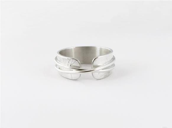 Narrow textured infinity ring in sterling silver