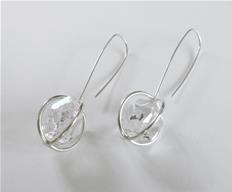 Geometric hollow earrings with Herkimer diamond quartz